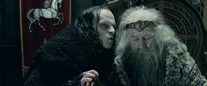 Grima Wormtongue whispers into his puppet king Theoden's ear in the Lord of the Rings film series